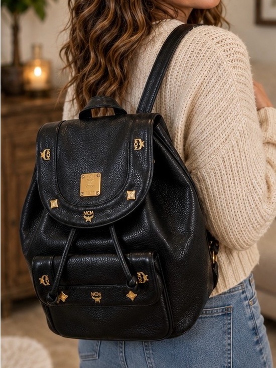 MCM Handbags - MCM Vintage Black Leather Backpack with Gold Logo Hardware